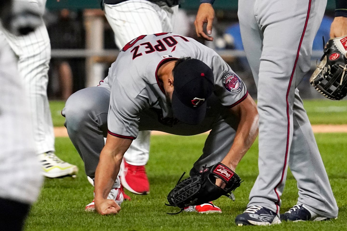 Twins relief pitcher Jorge Lopez reacts after the team's 4-3 loss to the Chicago White Sox on Friday