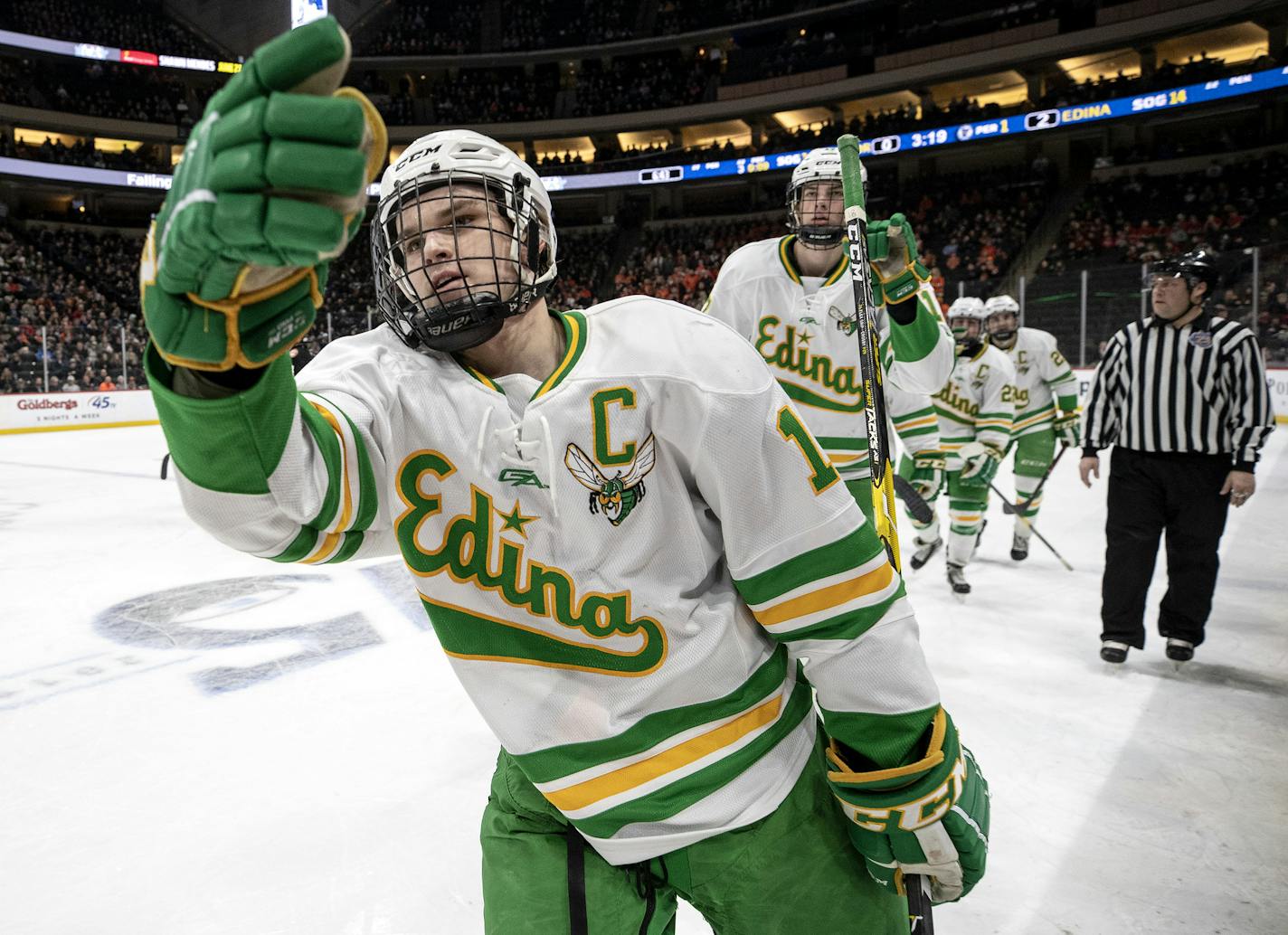 Mason Nevers (18) of Edina prepared to celebrate with teammates on the bench after scoring a goal in the first period. ] CARLOS GONZALEZ • cgonzalez@startribune.com – St. Paul, MN – March 7, 2019, Xcel Energy Center, Hockey, MSHL, Minnesota High School League Boys' Hockey State Hockey Tournament, Class 2A state quarterfinals Moorhead vs No. 1 Edina