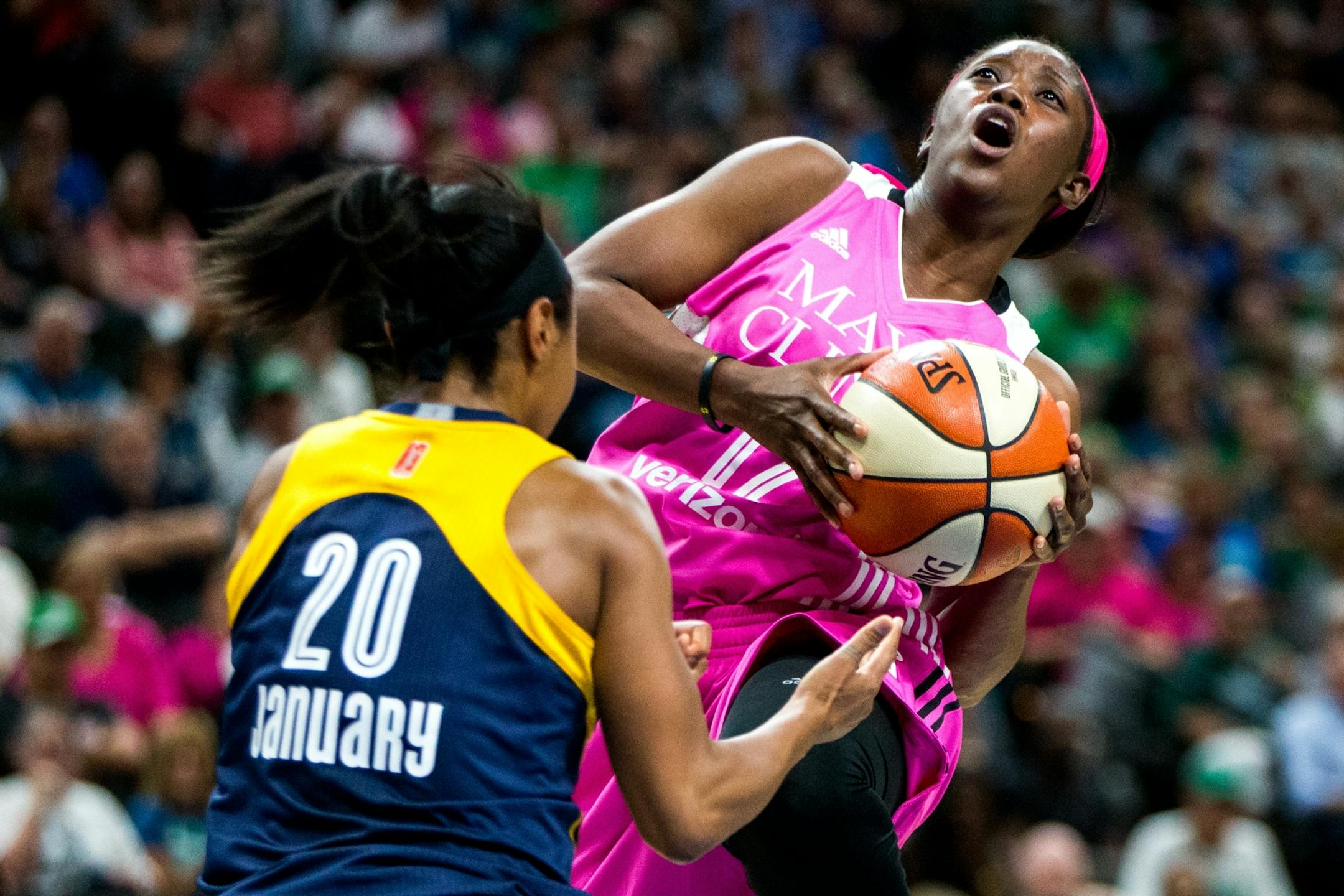Minnesota Lynx guard Alexis Jones (12) looks to shoot against Indiana Fever�s Briann January (20) during the first half on Friday, Aug. 18, 2017, at Xcel Energy Center.
