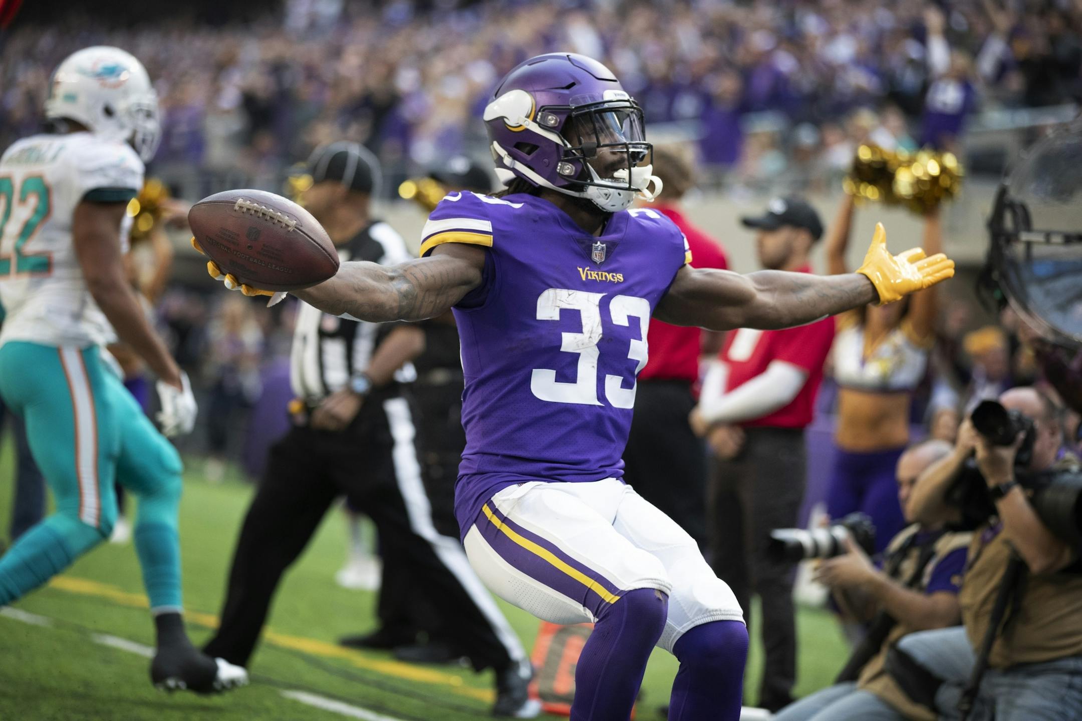 Minnesota Vikings running back Dalvin Cook (33) celebrated his first quarter 13-yard touchdown run at U.S. Bank Stadium Sunday December 16, 2018 in Minneapolis, MN.