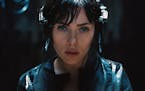 In this image released by Paramount Pictures, Scarlett Johansson appears in a scene from, "Ghost in the Shell." (Paramount Pictures and DreamWorks Pic