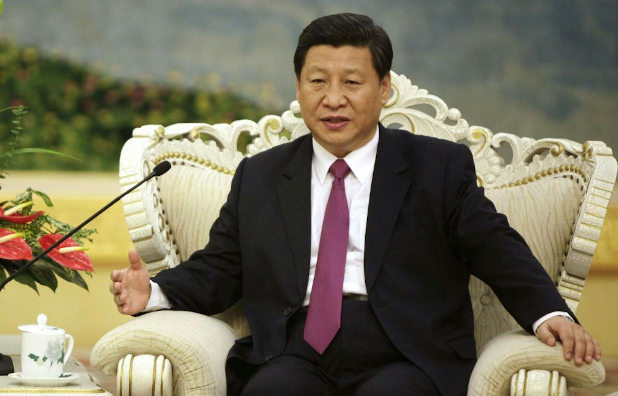 FILE - In this Aug. 29, 2012 file photo, Chinese Vice President Xi Jinping meets with Egypt's President Mohammed Morsi at the Great Hall of the People in Beijing. Leadership changes are imminent in East Asia's dominant economies,China, Japan and South Korea, in the midst of territorial disputes that could spark conflict. The new leaders who emerge will be crucial in setting the tone for relations with the next occupant of the White House. How the U.S. gets on with China affects the entire region