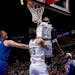The Timberwolves' Anthony Edwards dunks the ball against the Nuggets in the first quarter Tuesday at Target Center.
