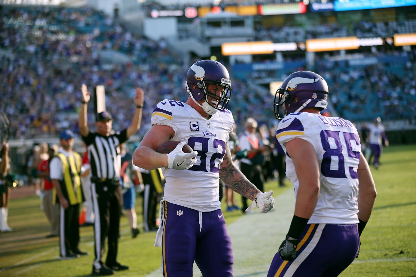 Minnesota Vikings tight end Kyle Rudolph (82) celebrated his 3-yard touchdown catch with tight end Rhett Ellison (85) in the forth quarter at EverBank Field on Sunday