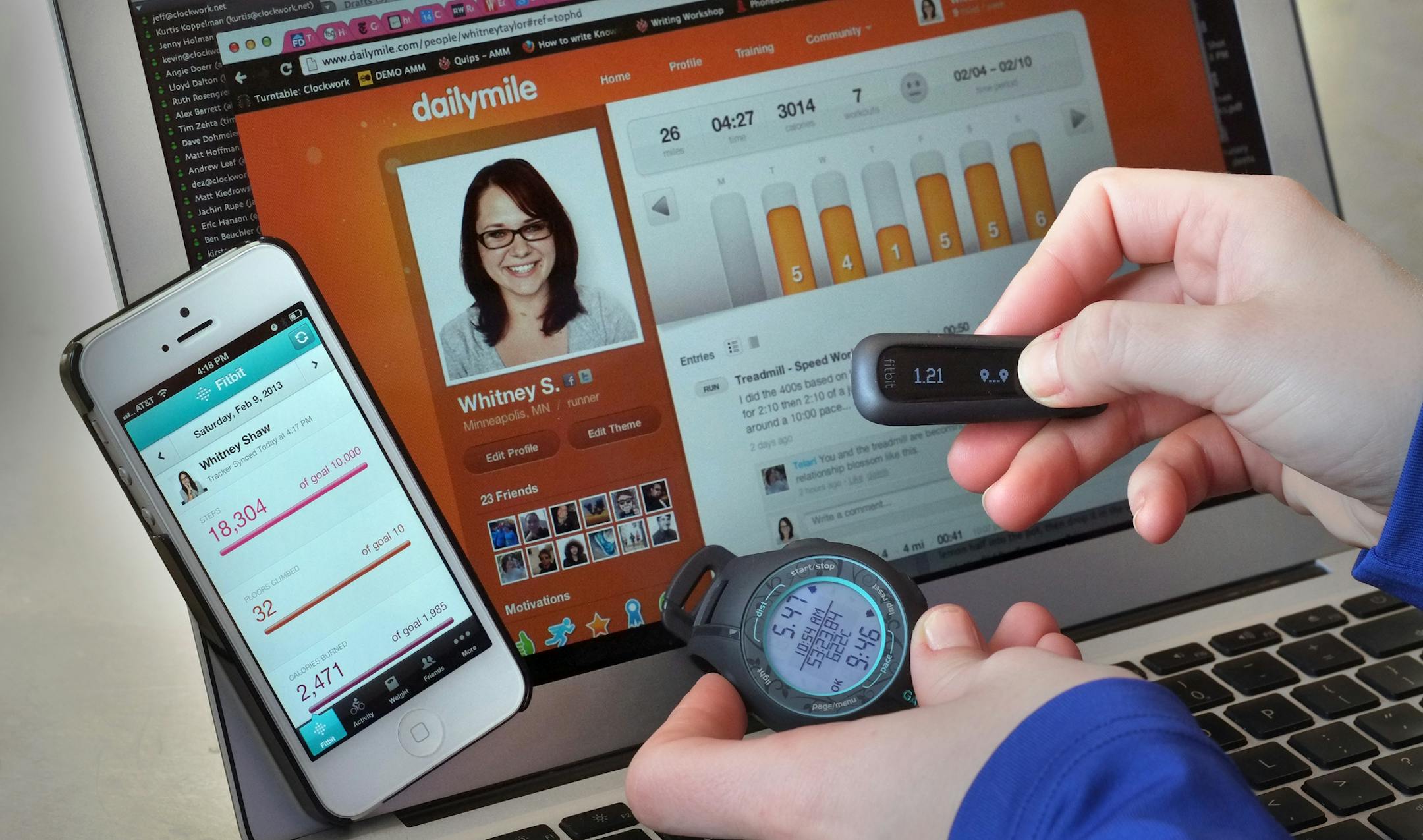 Tools to track movement for runners. __ Whitney Shaw shows off her instruments that help her clock her daily movements including her 5 mile run she was about to run. Then, she will use her smartphone to get data off her FitBit device and plug her watch into her computer to upload info to the social fitness site DailyMile. [ TOM WALLACE • twallace@startribune.com _ Assignments #20027649A_ Feburary 14, 2013_ SLUG: 684555 FIT030713_ EXTRA INFORMATION: magic saxo number is 684555