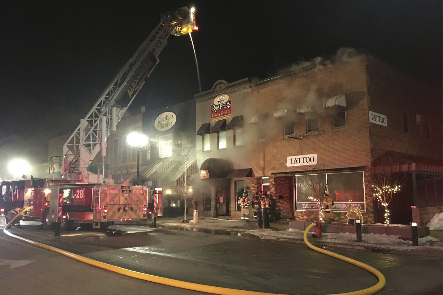 This photo provided by Douglas County (Minn.) Emergency Management in Alexandria, Minn., shows firefighters fighting a fire Tuesday, Feb. 25, 2020 that destroyed several buildings in downtown Alexandria. (Julie Anderson/Douglas County Emergency Management via AP) ORG XMIT: CER206