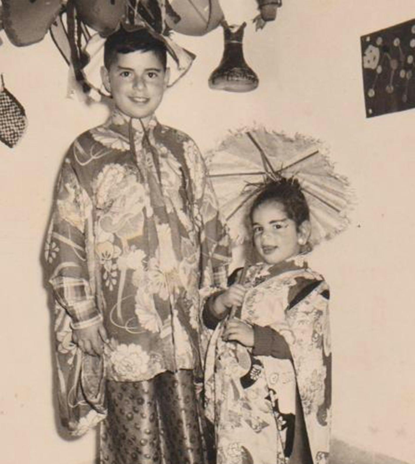 Cousins Tuvia and Ahuva Erlich as kids in Purim costumes