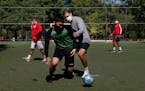 Youths wore masks to protect themselves from the spread of coronavirus played soccer in Asuncion, Paraguay. Two competing Minnesota youth soccer assoc