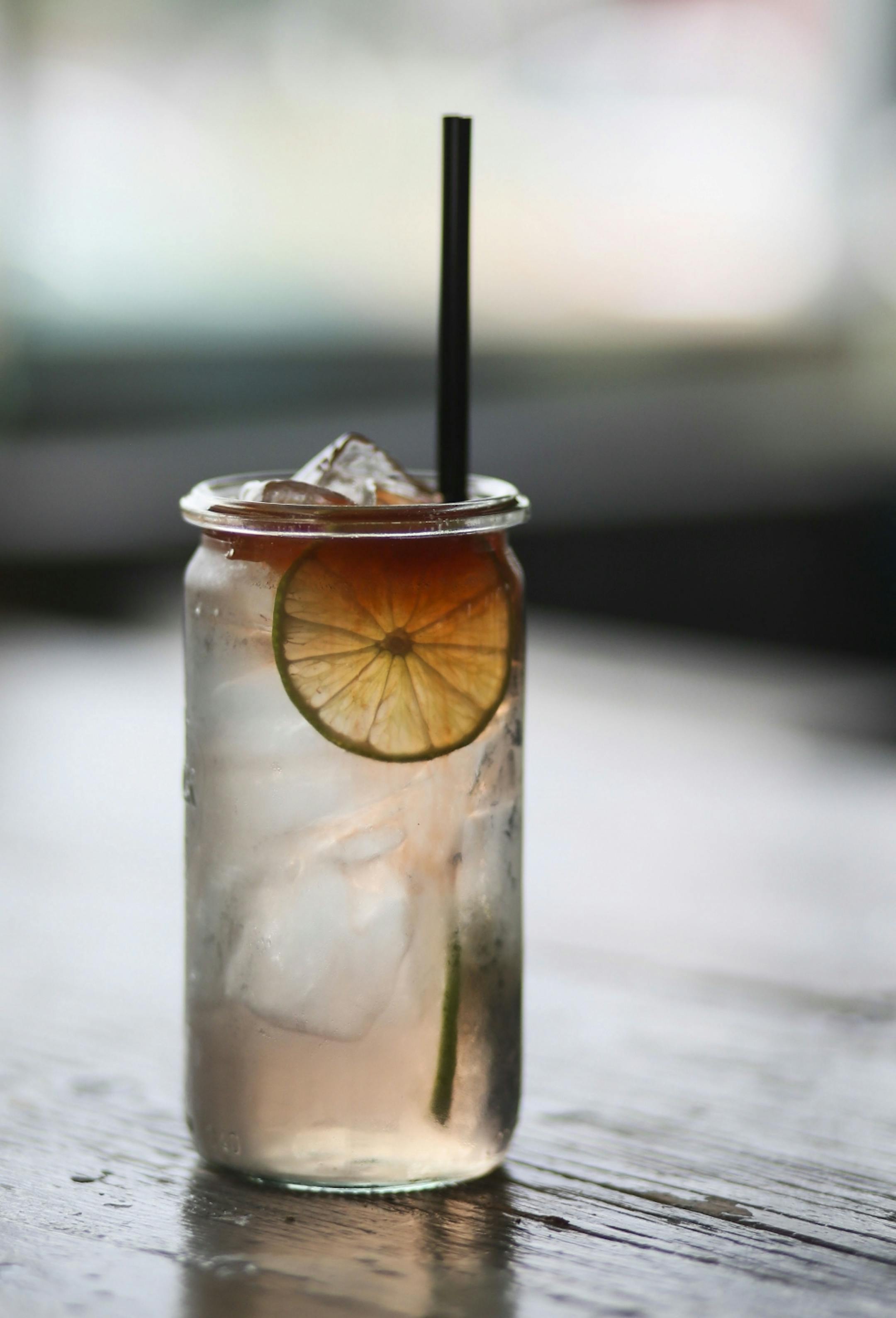 Hola Arepa, one of the city's great food trucks and now a restaurant, and the cocktail Elegant Bachelor with tequila, lime, zirbenz stone pine liqueur and grapefruit bitters Friday, Sept. 12, 2014, in Minneapolis, MN.