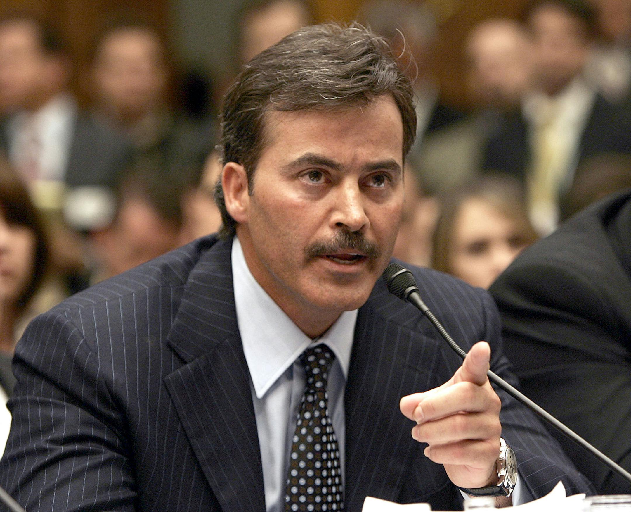 ** FILE ** Baltimore Orioles first baseman Rafael Palmeiro testifies on Capitol Hill in this March 17, 2005 file photo. (AP Photo/Gerald Herbert, File)
