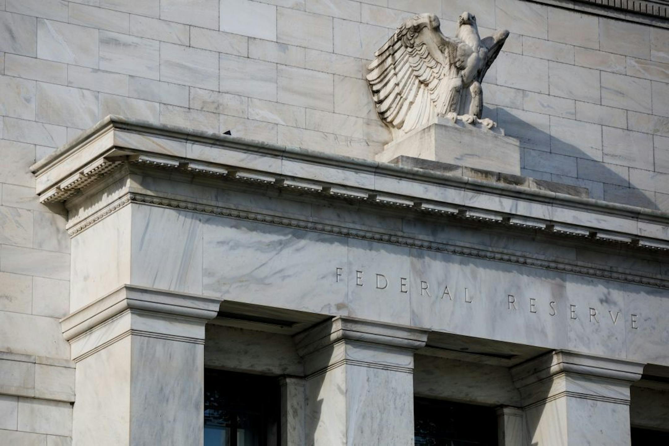 The Federal Reserve building in Washington, Sept. 23, 2019. The central bank cut rates by a full percentage point and announced a giant bond-buying campaign to insulate the economy against coronavirus fallout.