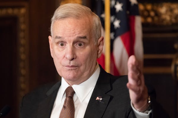 Governor Dayton called for legislators to support a MinnesotaCare Buy-in to give uninsured or underinsured people healthcare choices. ] GLEN STUBBE &#