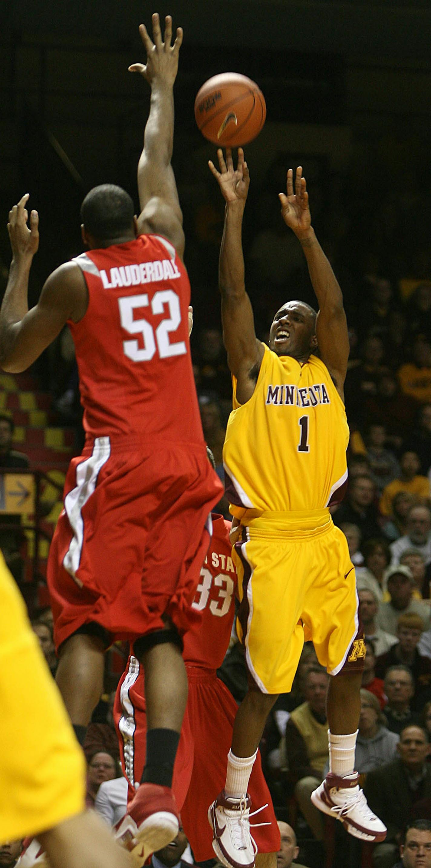 Minnesota's Lawrence McKenzie launched a second half shot over Ohio State's Dallas Lauderdale. Minnesota won the game, 71-57.