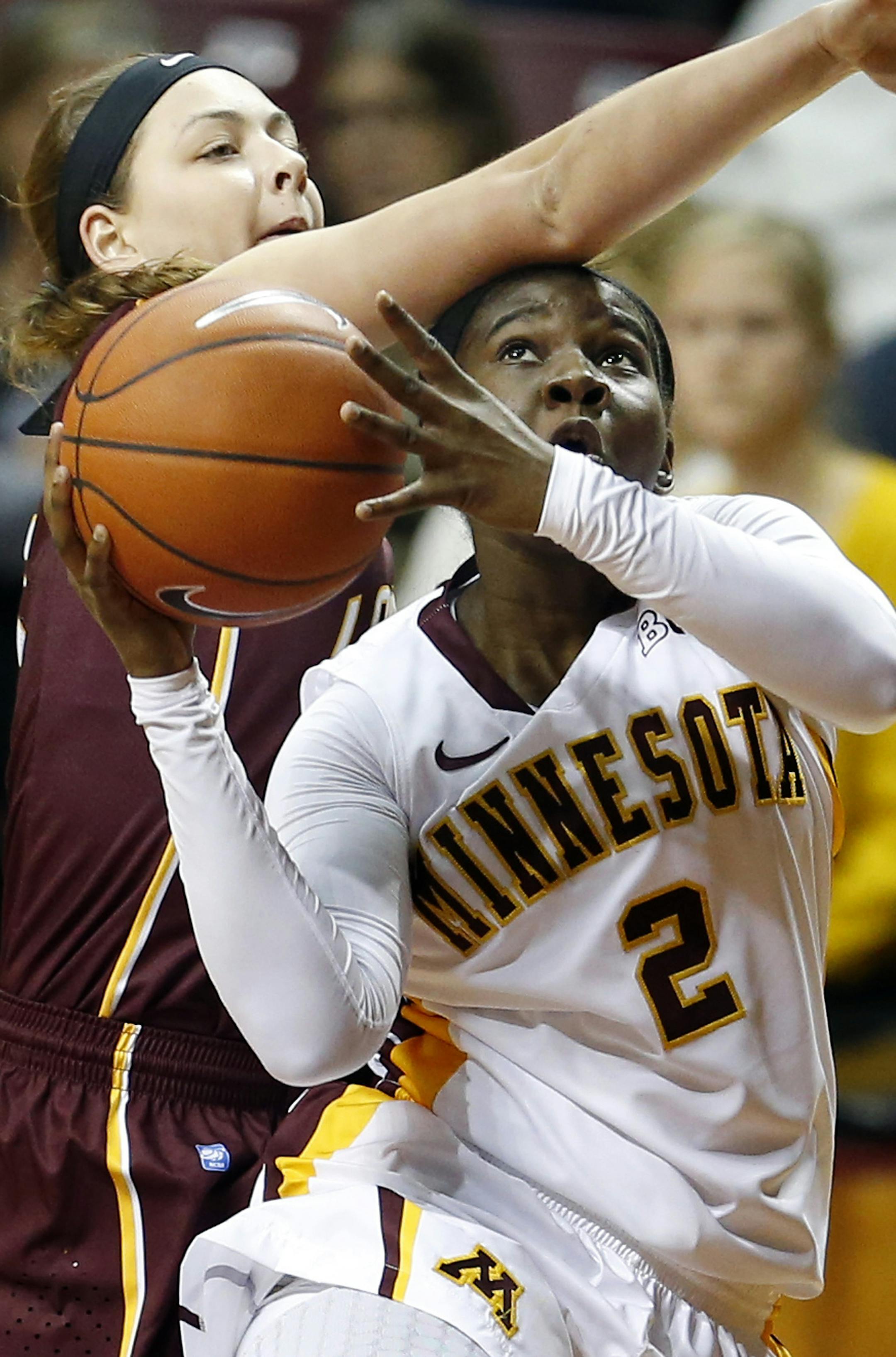 Stabresa McDaniel (2) attempted a shot while being defended by Bailey Farley (5) in the second half. Minnesota beat Loyola by a final score of 80-36. ] CARLOS GONZALEZ cgonzalez@startribune.com - November 26, Minneapolis, Minn., Williams Arena, NCAA Womens Basketball, University of Minnesota Gophers vs. Loyola