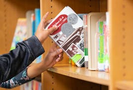 Book circulation is up in both the St. Paul and Minneapolis school districts, but the two differ in their approach to having librarians in the element