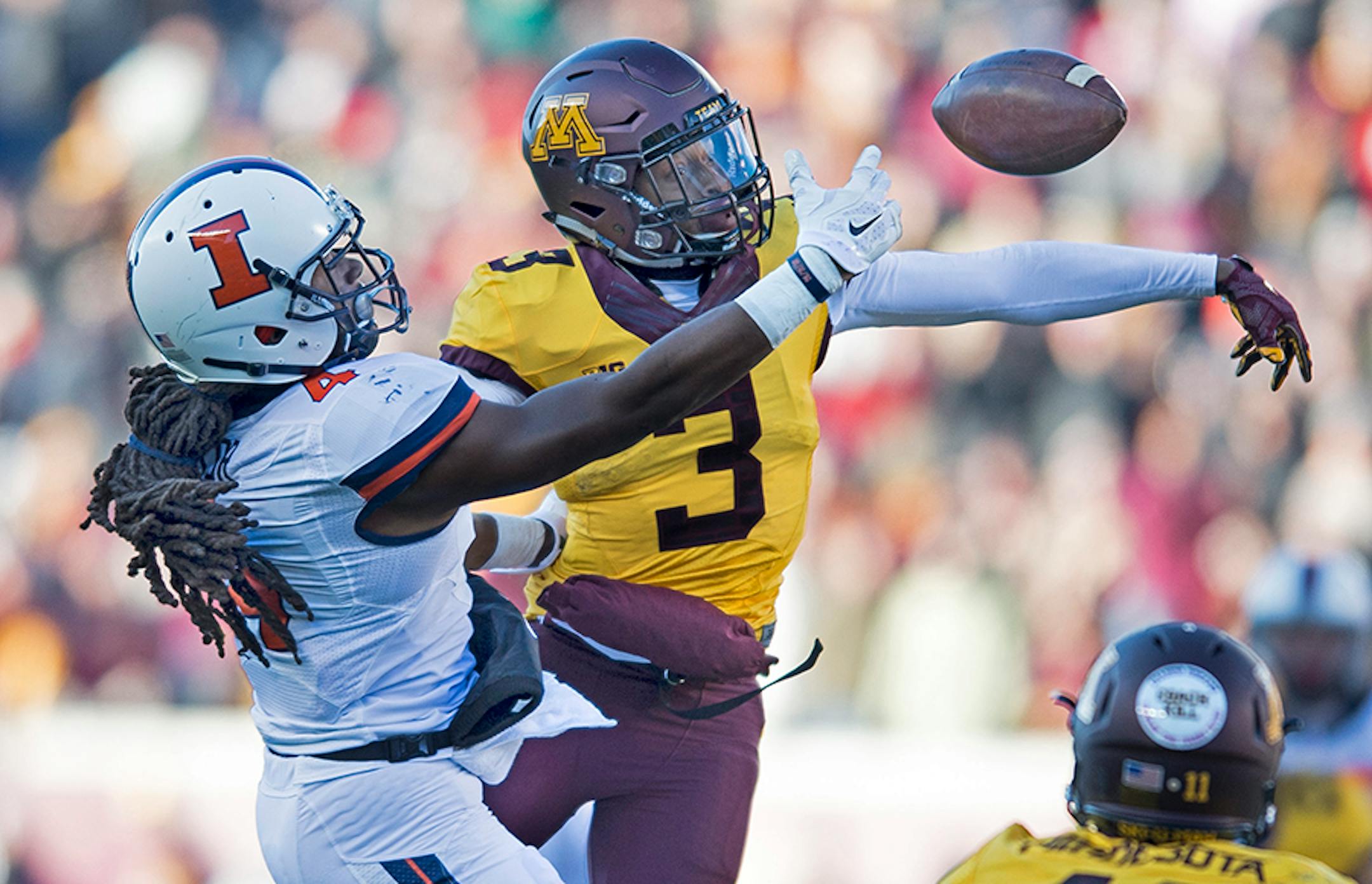Minnesota Golden Gophers defensive back KiAnte Hardin (3) batted away a pass intended for Illinois Fighting Illini wide receiver Dionte Taylor (4), last season.
