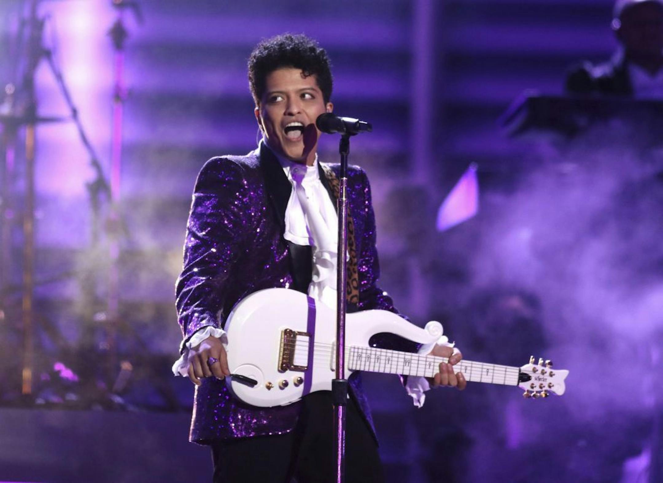 Bruno Mars performs a tribute to Prince at the 59th annual Grammy Awards.