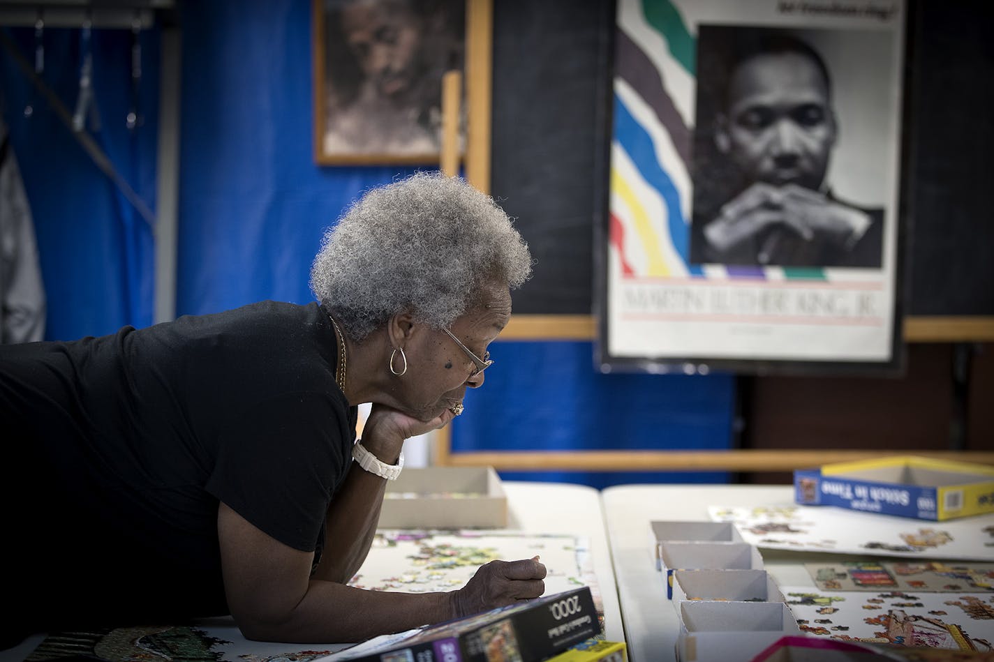 Marcileen Martin worked on a puzzle at the Sabathani Senior Center on Monday in Minneapolis.