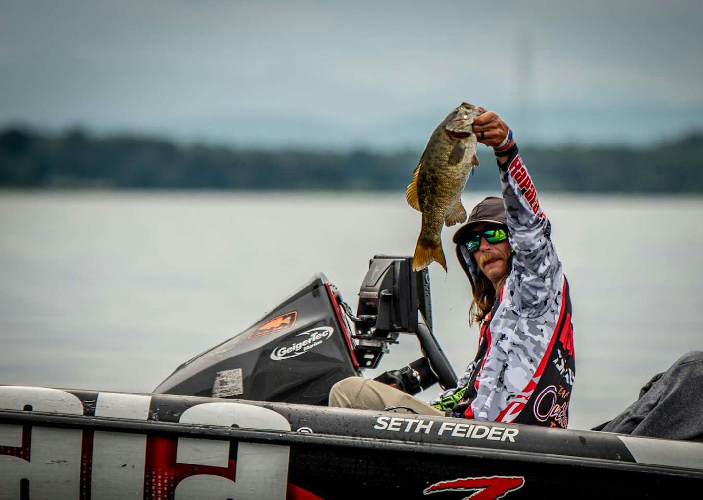 Seth Feider showed off a big bass Sunday during the Bassmater Elite tournament on Lake Champlain.