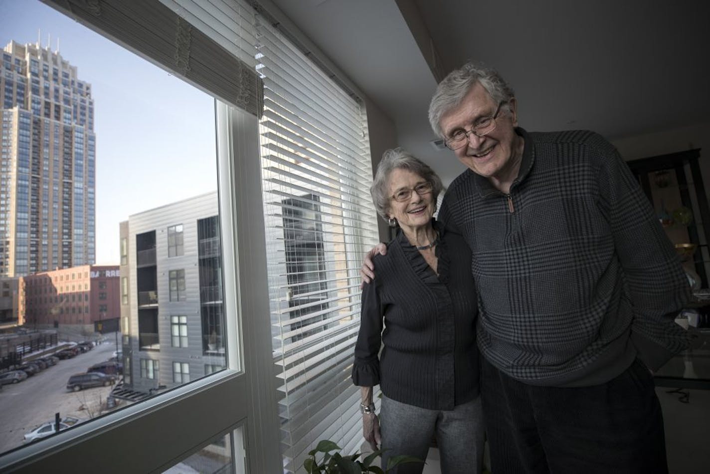 Dr. Dodd Wilson and wife Ginger moved into their downtown Minneapolis condo in Abiitan Mill City nine months ago. The area shows no signs of cooling off as its population continues to grow.