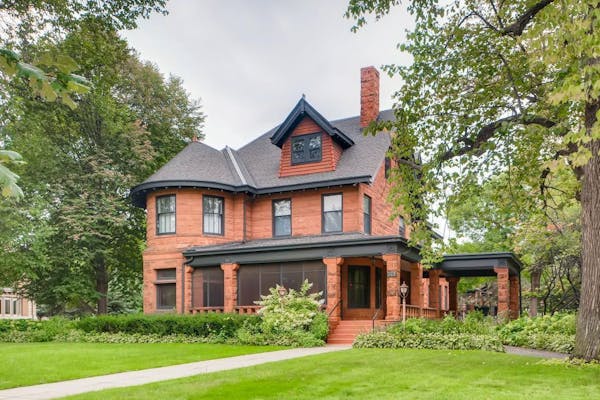 $1.2 million Queen Anne brownstone on the corner of Grotto and Summit Avenue in St. Paul.