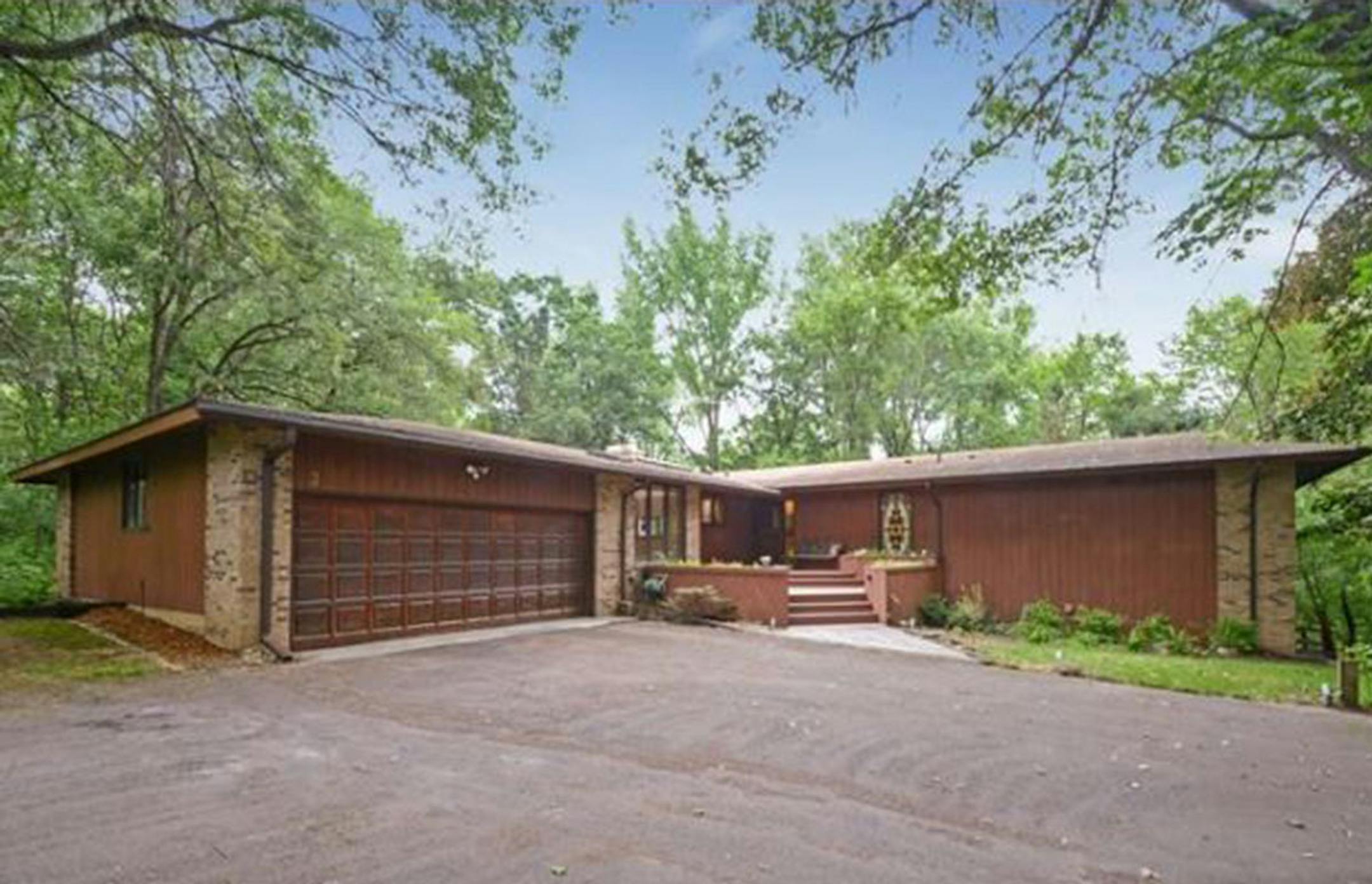 ...North Oaks
Built in 1973, this five-bedroom, four-bath house has 4,161 finished square feet and features three bedrooms on the main level, eat-in kitchen with stainless steel refrigerator and double ovens, two fireplaces, full finishing walkout basement with wet bar, deck, hot tub, two-car attached garage and second two-car detached garage. Listed by David Vanneste, 651-481-6711, and Sangeeta Chopra, 651-600-8537, Edina Realty.