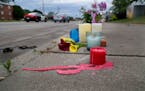 Spilled wax from a memorial candle has dried on the sidewalk in Falcon Heights Thursday, July, 7, 2016, near where Philando Castile, 32, a St. Paul sc