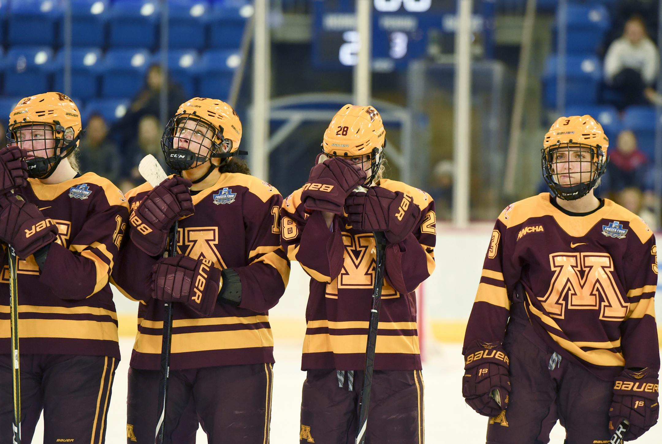 Minnesota players line up for the second-place awards after losing 2-0 to Wisconsin in the NCAA Division I women's Frozen Four hockey championship game Sunday, March 24, 2019, in Hamden, Conn. (AP Photo/Stephen Dunn)