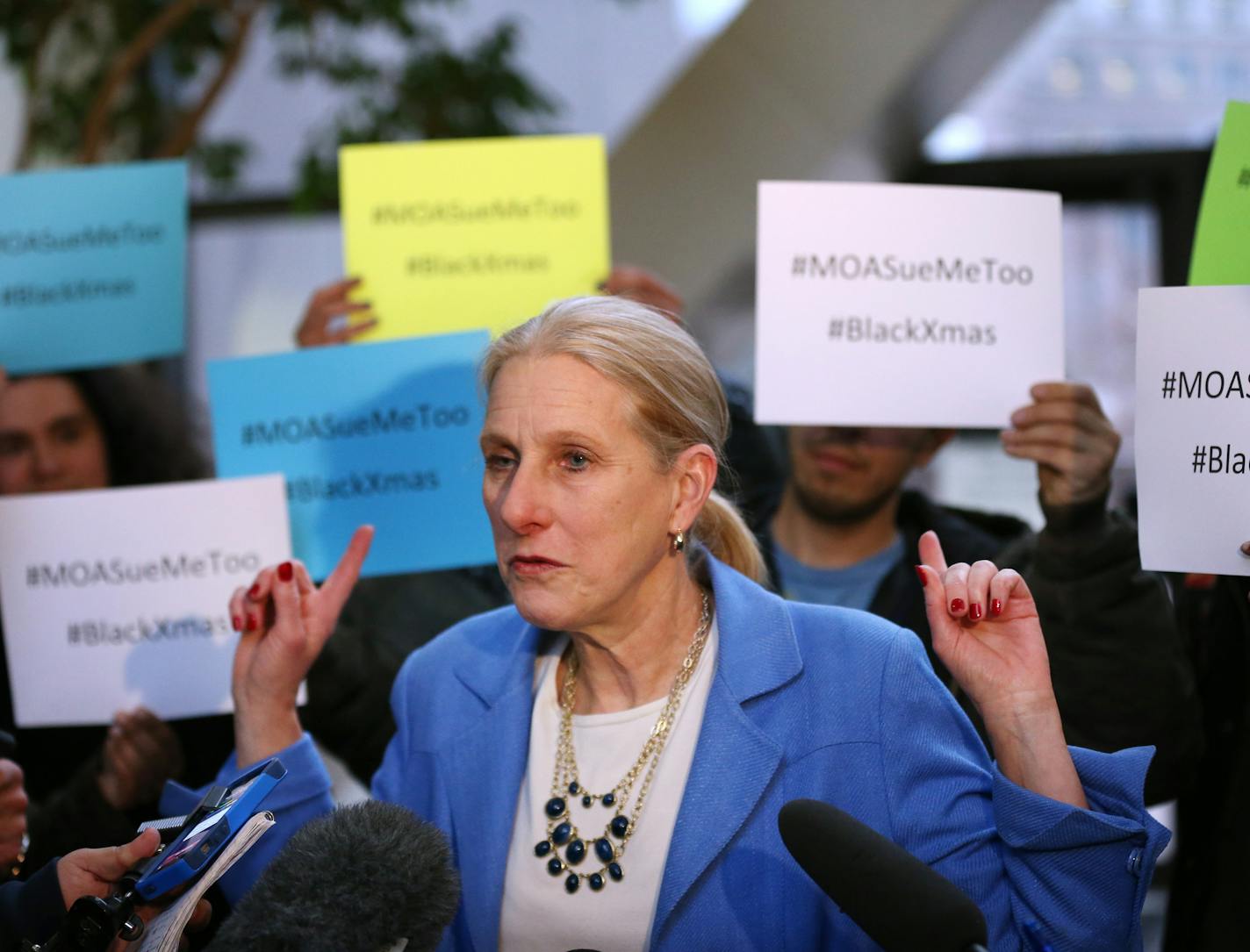 Mall of America attorney Susan Gaertner was surrounded by Black Lives Matter members as she spoke with media after a hearing at the Hennepin County Government Center Monday.