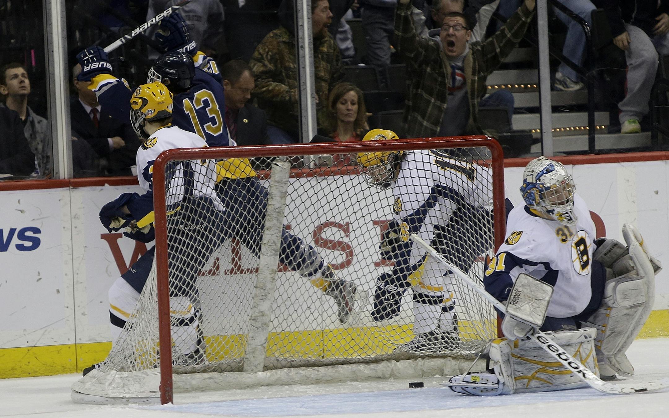 Zach Kramer's shot made its way past Breck's Henry Johnson to win the Class 1A boys' hockey state tournament semifinal for Hermantown in double overtime.