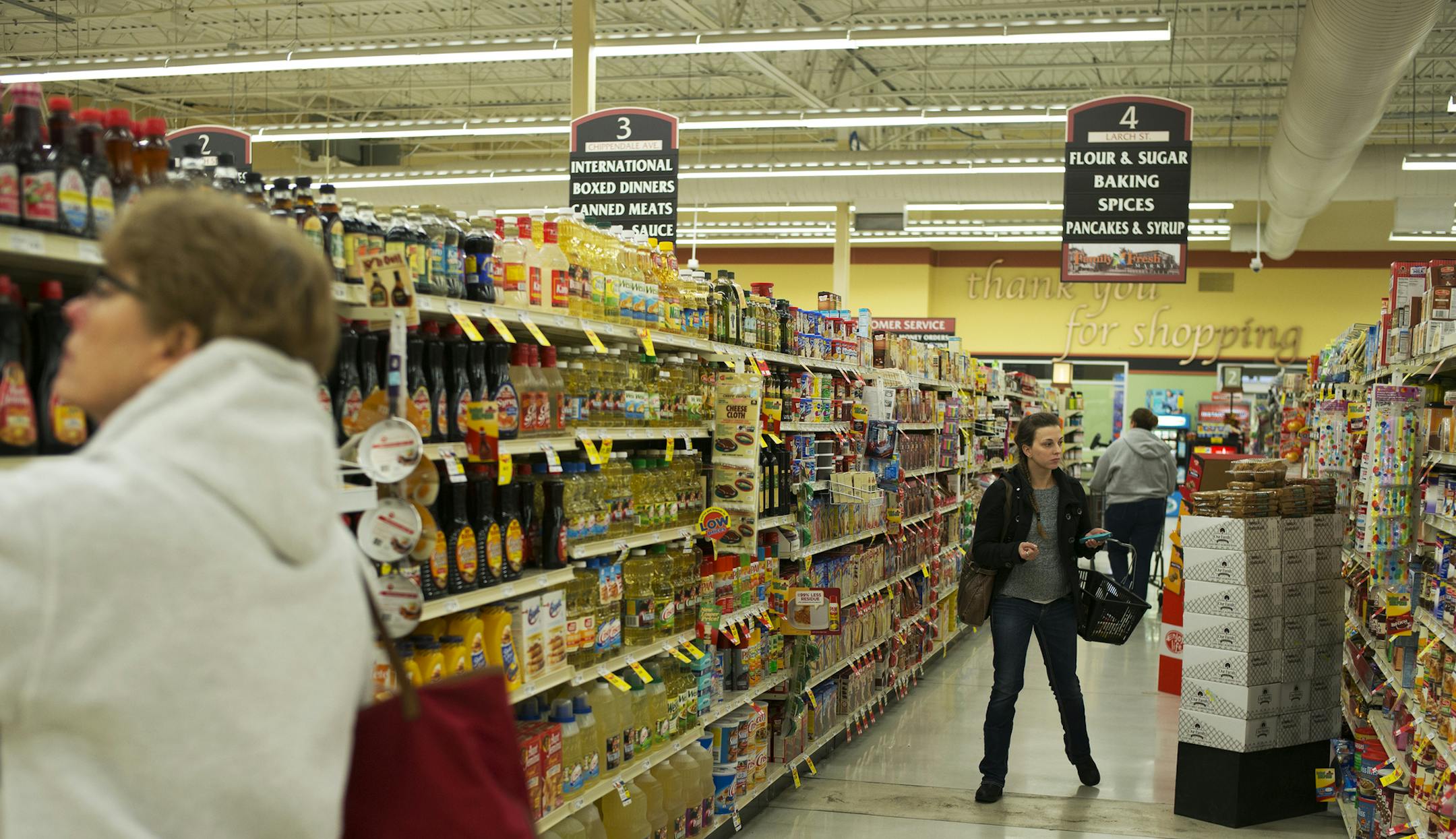 At the Family Fresh grocery market in Farmington, shoppers peruse the aisles of the market which is open seven days a week. ] Richard Tsong-Taatarii/ rtsong- taatarii@startribune.com