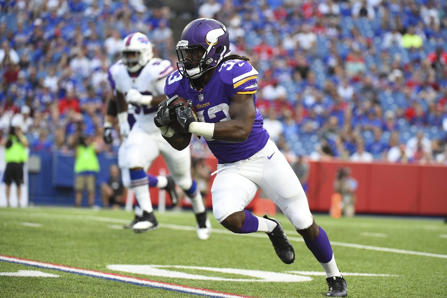 Minnesota Vikings running back Dalvin Cook (33) rushes during the first half of a preseason NFL football game against the Buffalo Bills Thursday, Aug. 10, 2017, in Orchard Park, N.Y. (AP Photo/Rich Barnes)