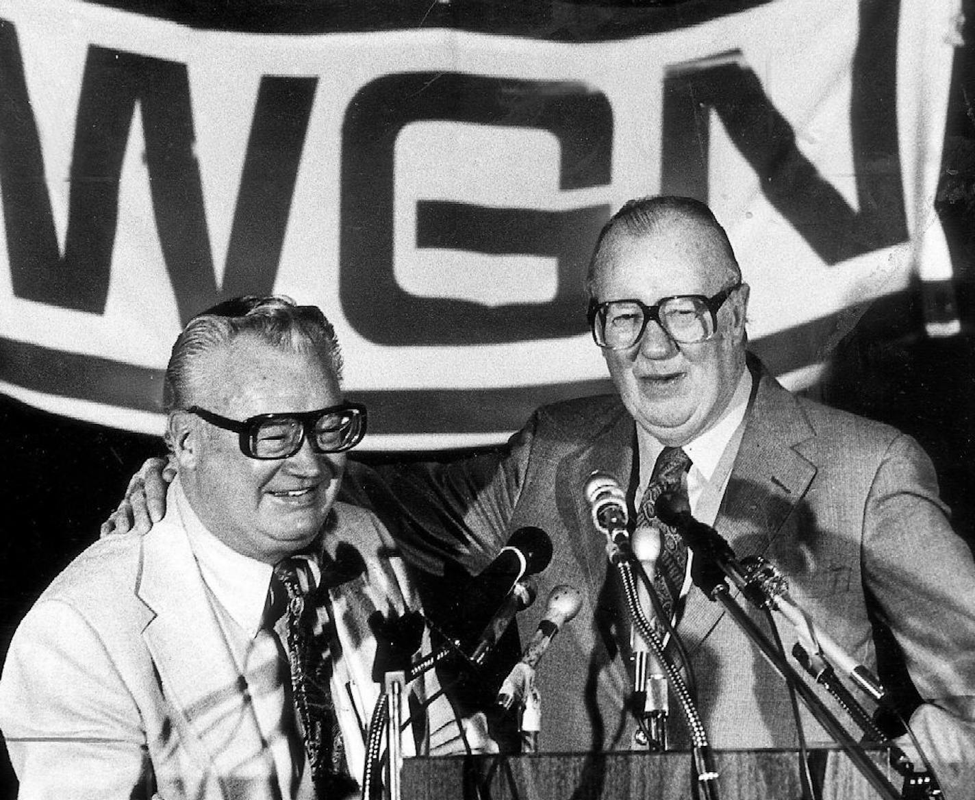 Retiring WGN broadcaster Jack Brickhouse (right) introduces Harry Caray on Nov. 16, 1981 when he signed a two-year contract with WGN to broadcast Cubs games.