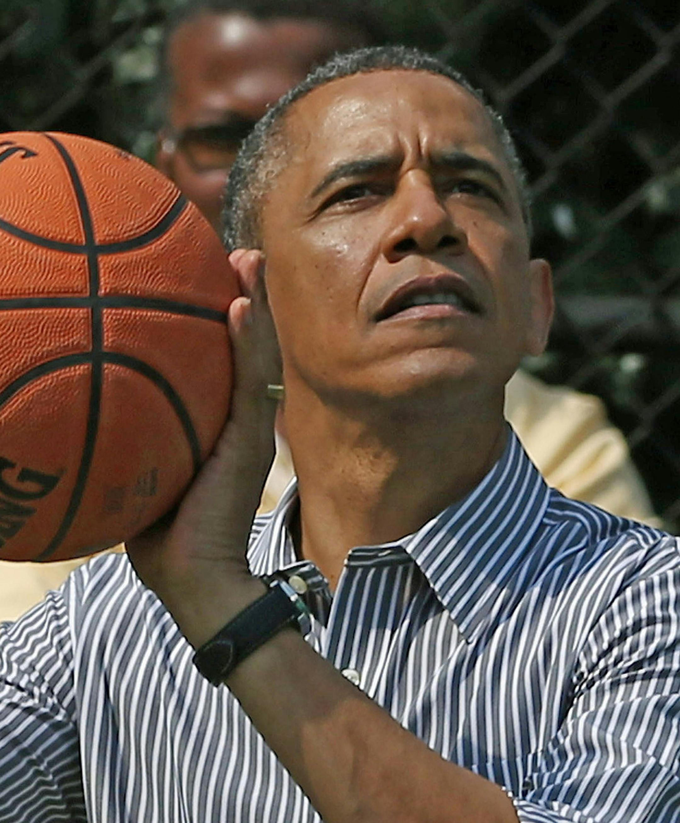 United States President Barack Obama plays basketball during the annual Easter Egg Roll on the White House tennis court April 1, 2013 in Washington, DC. Thousands of people are expected to attend the 134-year-old tradition of rolling colored eggs down the White House lawn that was started by President Rutherford B. Hayes in 1878. .Credit: Mark Wilson / Pool via CNP Photo by: Mark Wilson/picture-alliance/dpa/AP Images ORG XMIT: 130402-90-001858