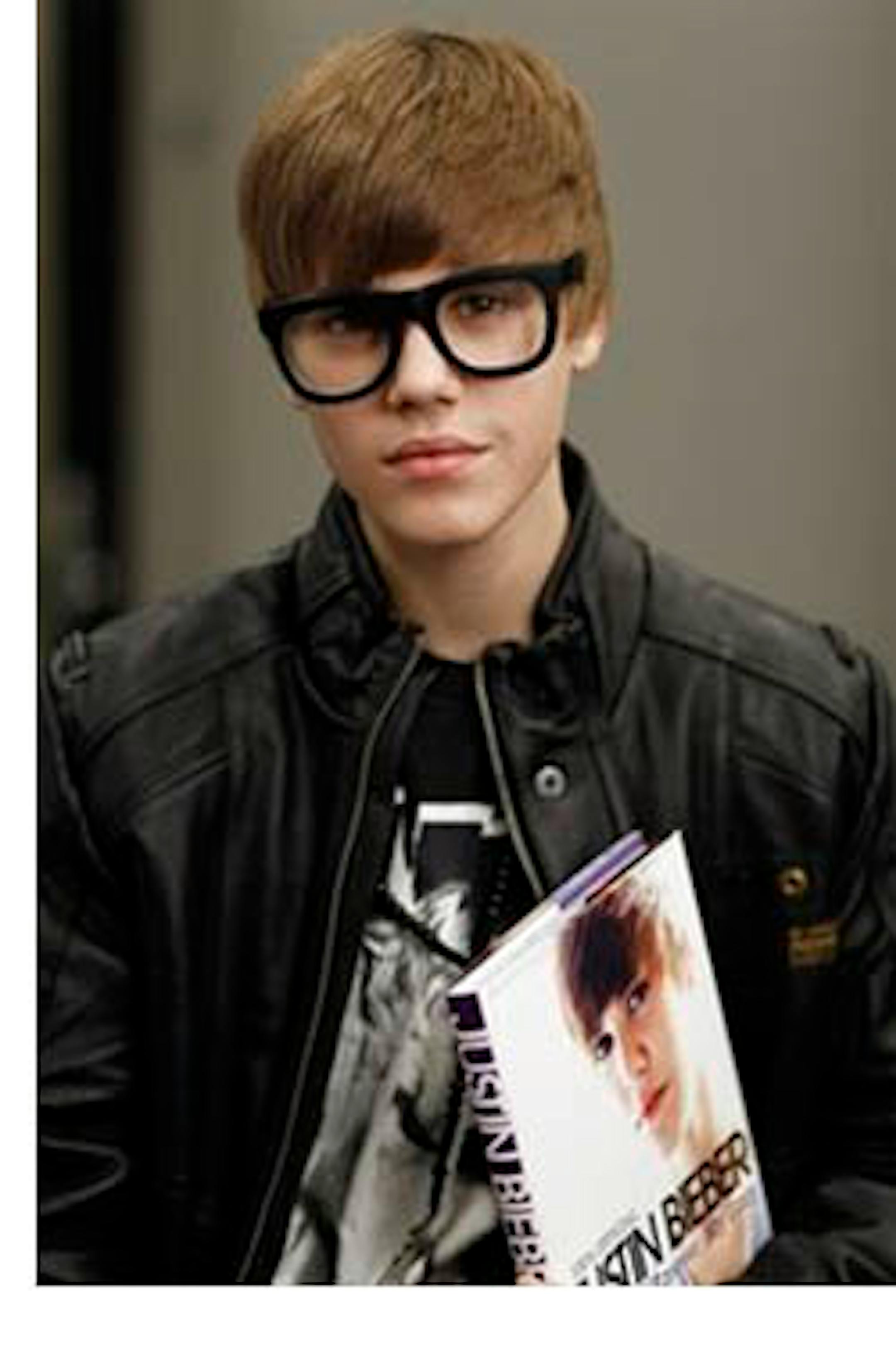Musician Justin Bieber poses for a portrait while promoting his new book, "Justin Bieber: First Step 2 Forever", in Los Angeles, Sunday, Oct. 31, 2010. (AP Photo/Matt Sayles)