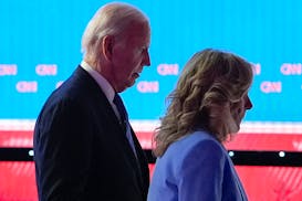 President Joe Biden walks off the debate stage with First Lady Jill Biden on June 27 in Atlanta.
