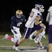 Waconia WR Will Koppi(10) makes a long yardage run for a touchdown in the first half.