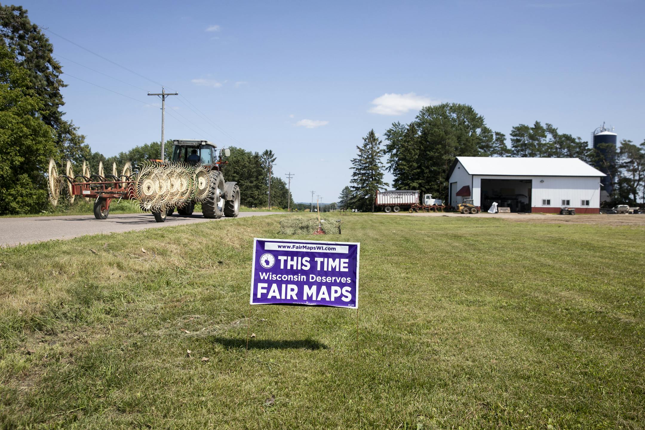 **EMBARGO: No electronic distribution, Web posting or street sales before 3:01 a.m. ET Aug. 15, 2019. No exceptions for any reasons. EMBARGO set by source.** A sign on the farm of Hans Breitenmoser, a dairy farmer and Lincoln County supervisor, in Merrill, Wis., Aug 1, 2019. Breitenmoser brought a measure calling for nonpartisan maps in 2017. Grassroots campaigns against partisan maps won big victories last year, but after an adverse Supreme Court ruling, they face an uphill battle. (Jenn Ackerm