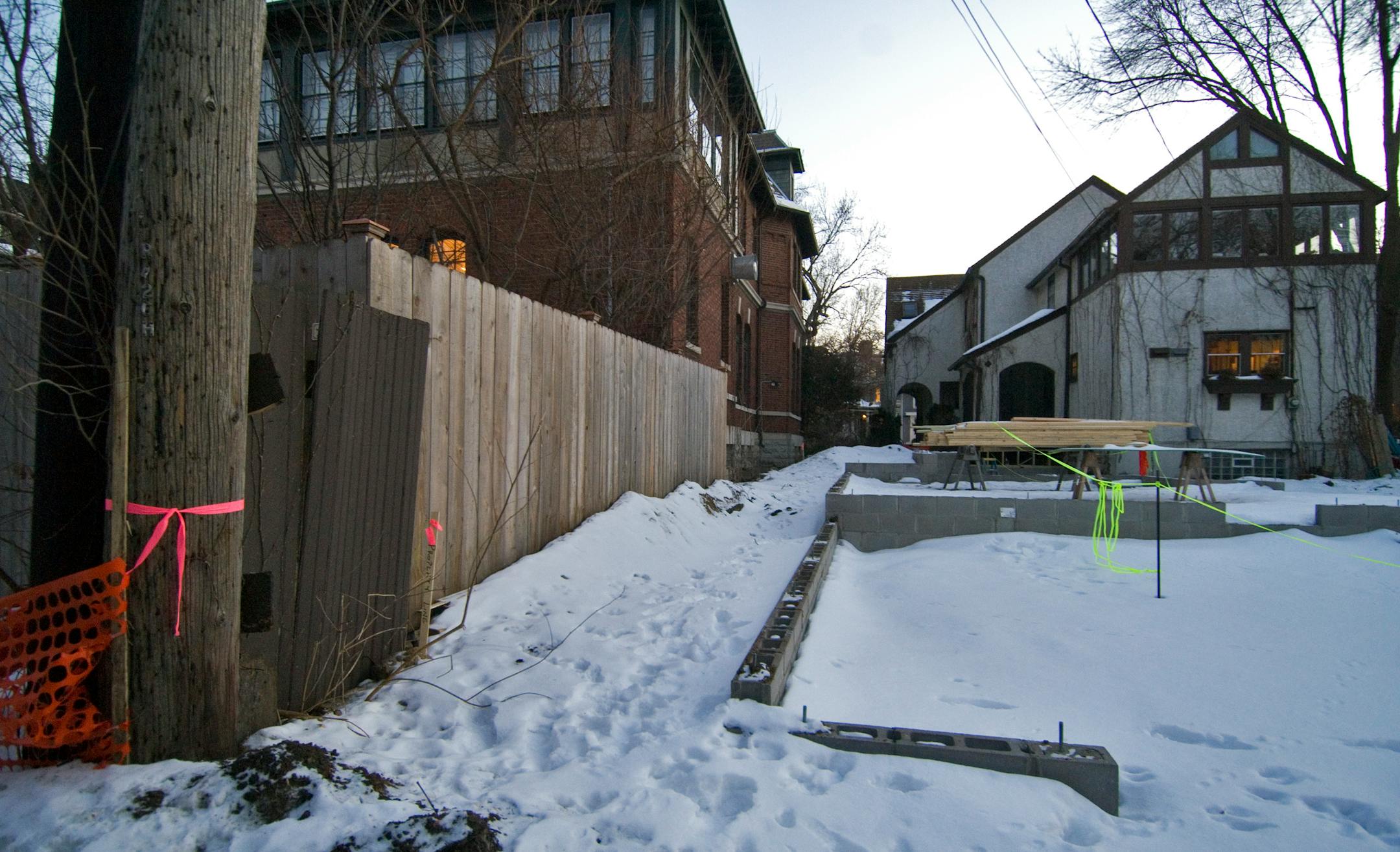 From the alley, Keillor's house is on the left. At right is Anderson's house, with some of the construction visible.