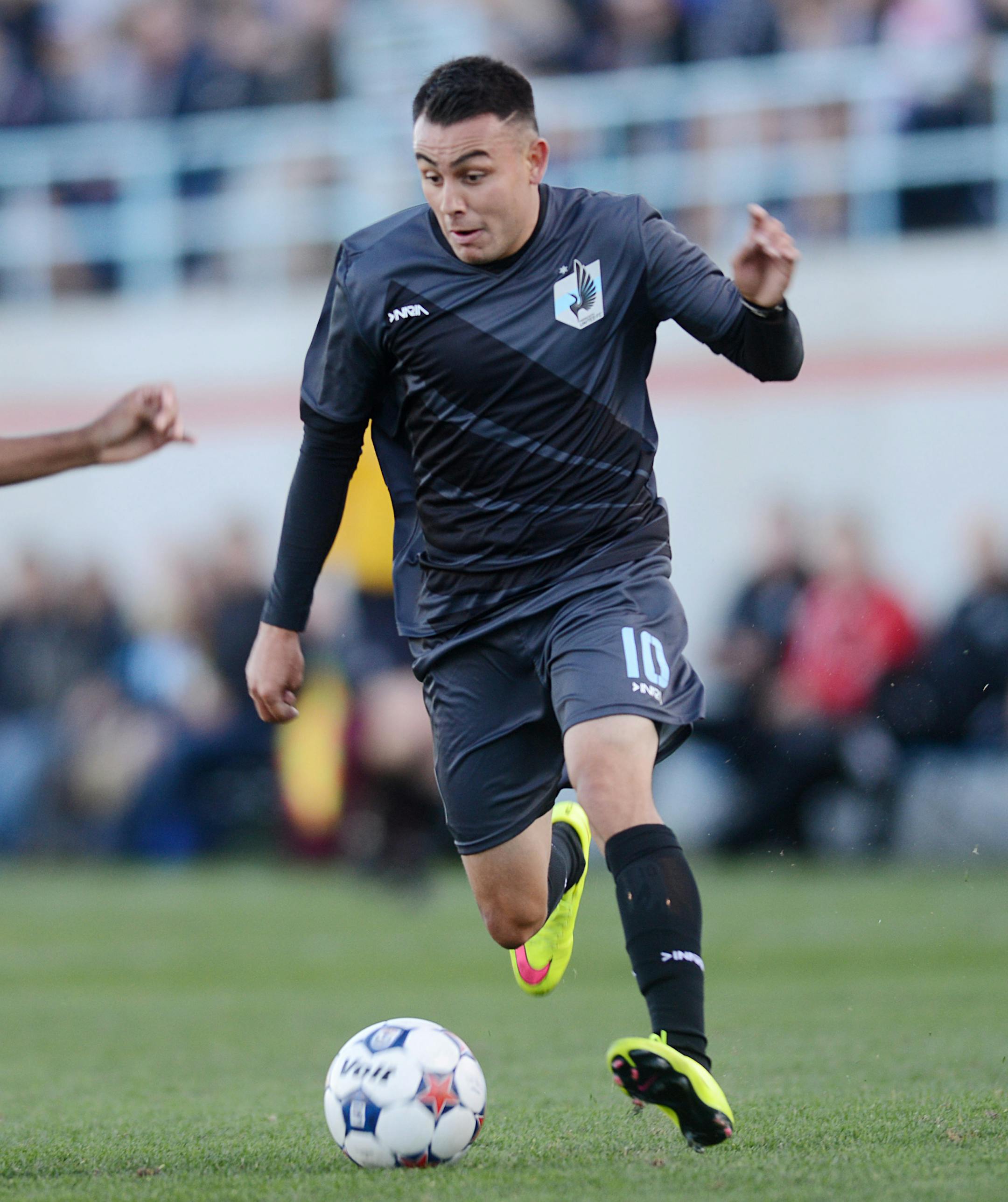Miguel Ibarra attempts to keep the ball away from San Antonio. ] BRIDGET BENNETT SPECIAL TO THE STAR TRIBUNE &#xa5; bridget.bennett@startibune.com United home-opener against San Antonio April 25, 2015 at National Sports Center in Blaine, MN. The final score was a tie 2-2 ORG XMIT: MIN1504252207520619