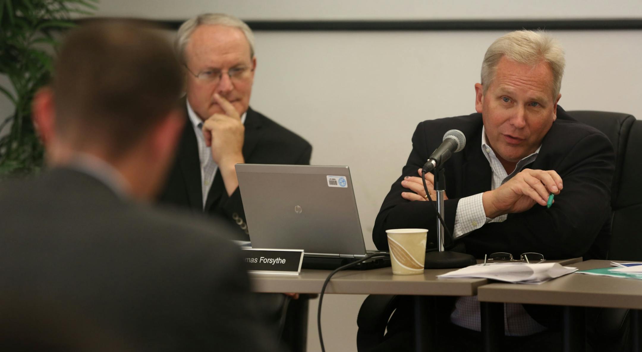 Board member Thomas Forsythe asked questions of Mike Turpin, general counsel of MNsure, during a meeting to talk about accidental release of private information in St. Paul Friday September 20, 2013.
