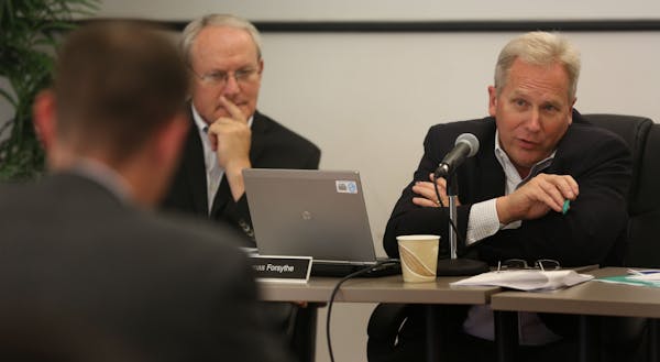 Board member Thomas Forsythe asked questions of Mike Turpin, general counsel of MNsure, during a meeting to talk about accidental release of private i