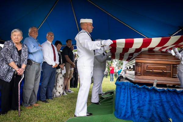 The family stood for the military honors during the funeral service for Glenn Cyriack at St. John’s Immanual Lutheran Cemetery on Friday, June 9, 20