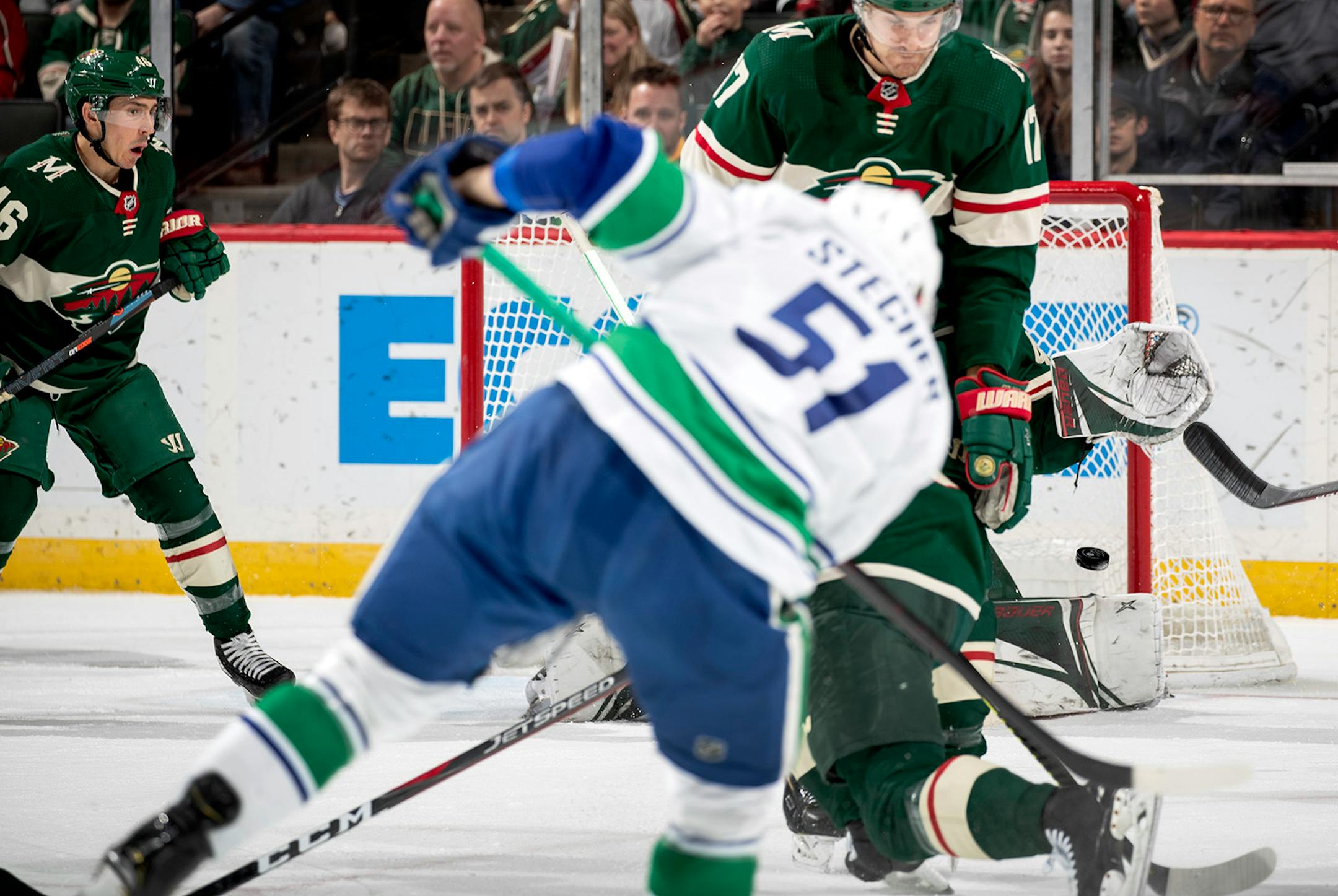 Troy Stecher (51) shot the puck past Minnesota Wild goalie Devan Dubnyk for a goal in the second period.