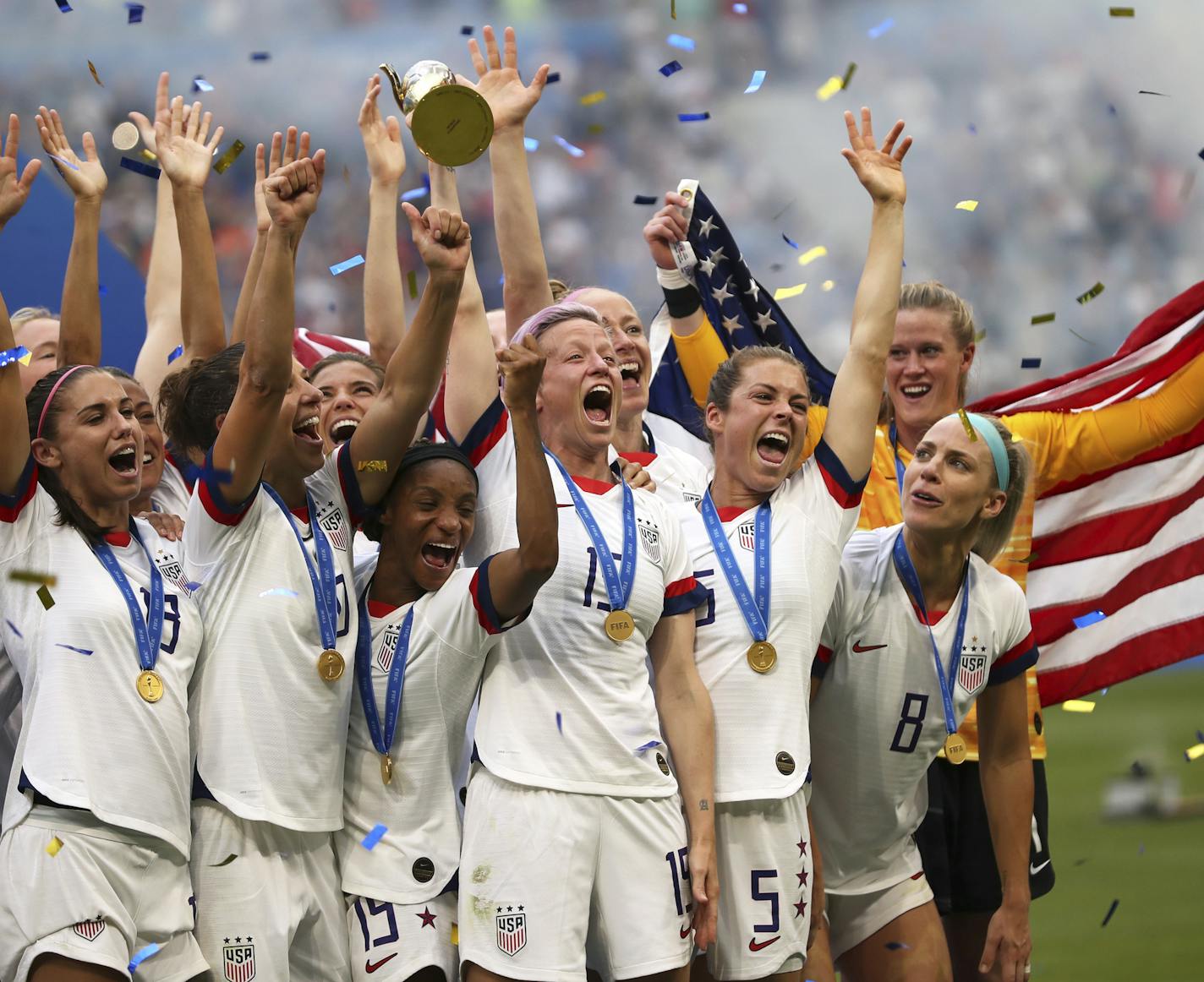 Megan Rapinoe holds the trophy celebrating at the end of the Women's World Cup final soccer match between US and The Netherlands.