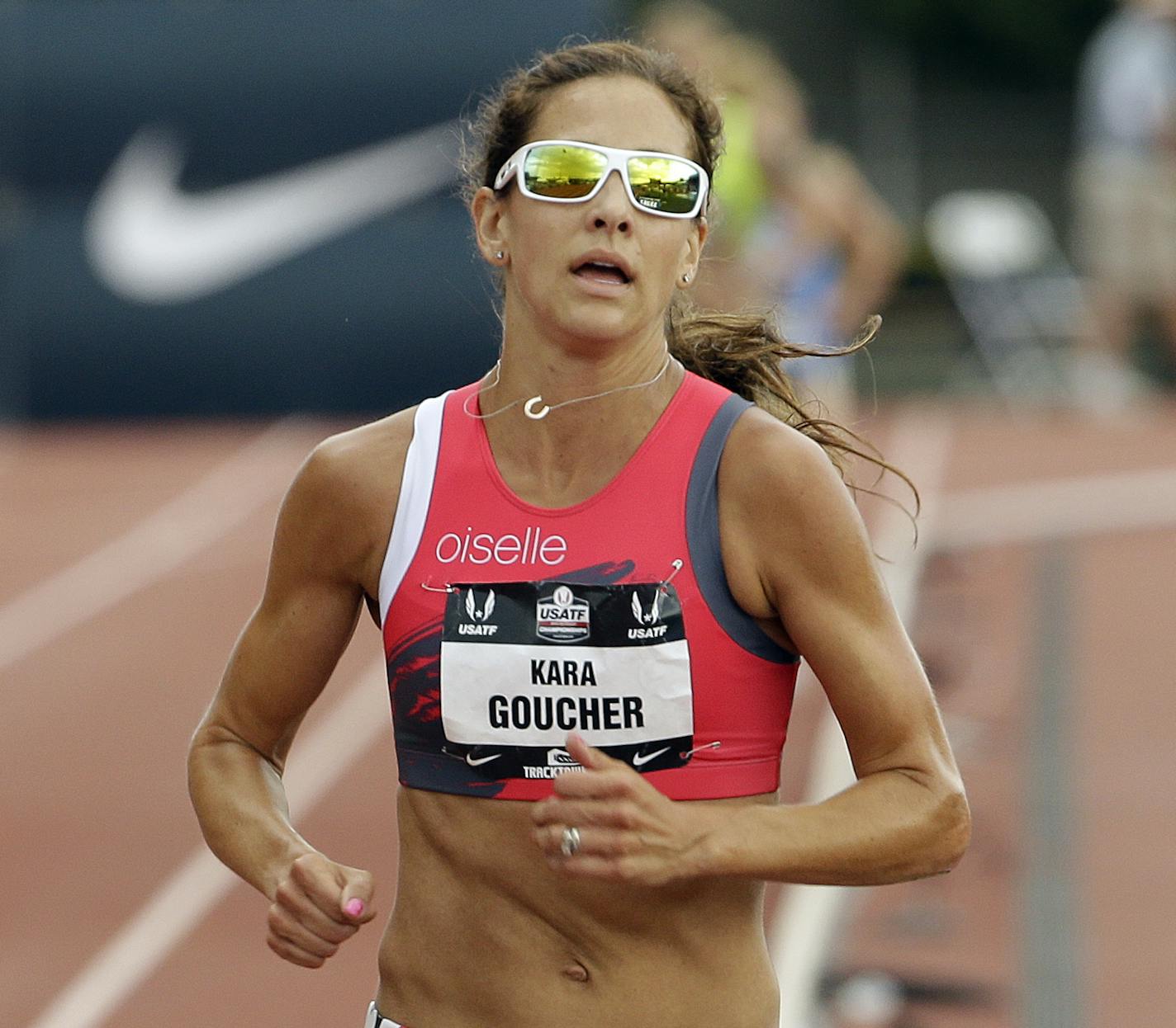 Kara Goucher runs in the 5,000-meter at the U.S. Track and Field Championships in Eugene, Ore., Sunday, June 28, 2015. Goucher took exception at being called a liar by Alberto Salazar after her former coach went public to clear his name over doping allegations. (AP Photo/Don Ryan)