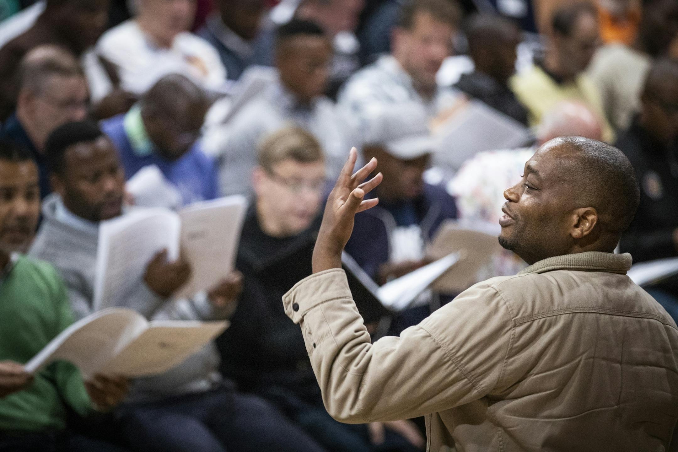 Sidwell Mhlongo, conductor of Gauteng Choristers, leads a rehearsal of the song Ruri.