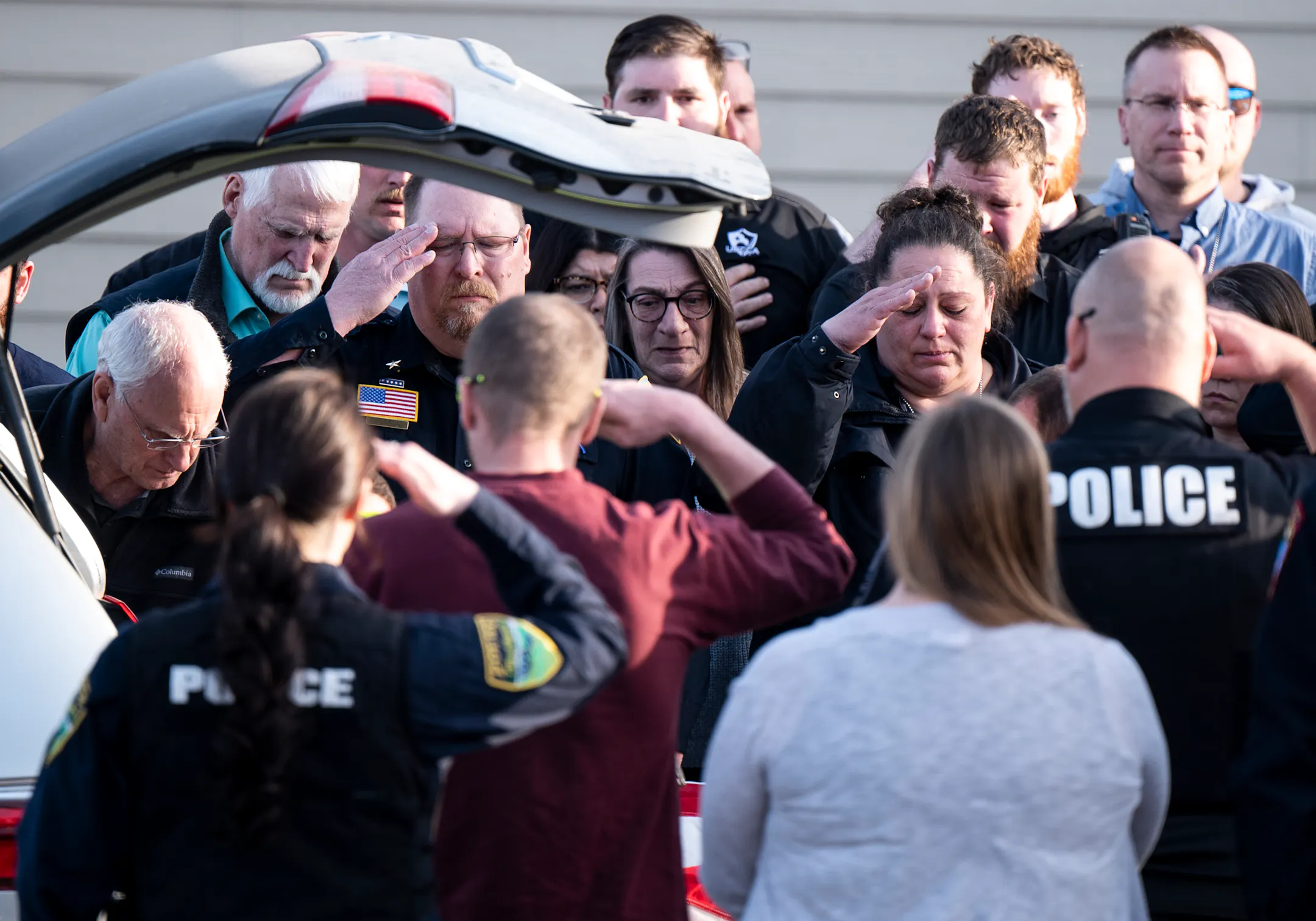 Western Wisconsin towns mourn 2 police officers shot over the weekend