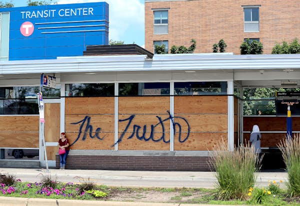 Windows were still broken out and boarded up at the Transit Center on Chicago Avenue near Lake Street in Minneapolis following the killing of George F