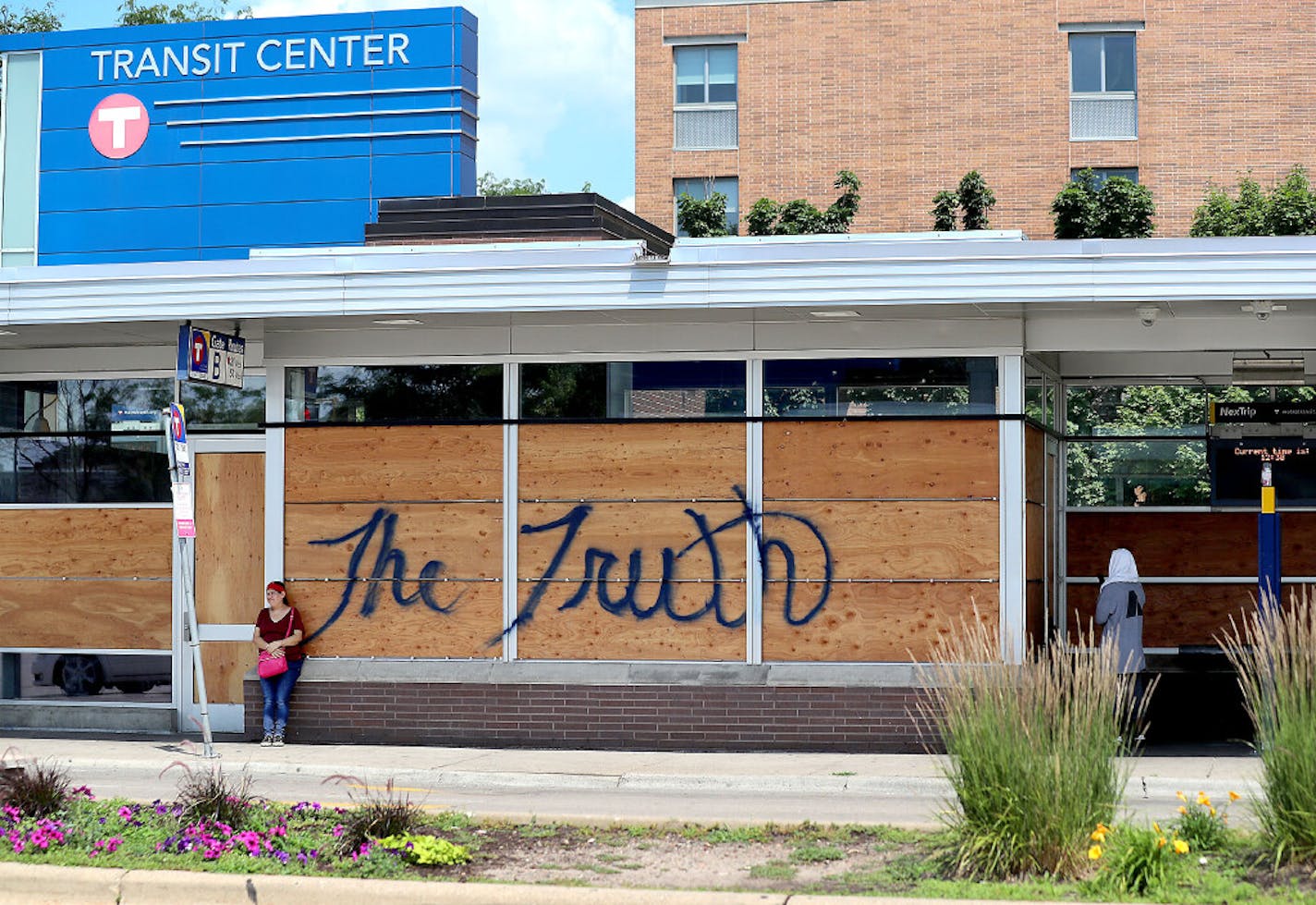 Windows were still broken out and boarded up at the Transit Center on Chicago Avenue near Lake Street in Minneapolis following the killing of George Floyd and the unrest that followed.